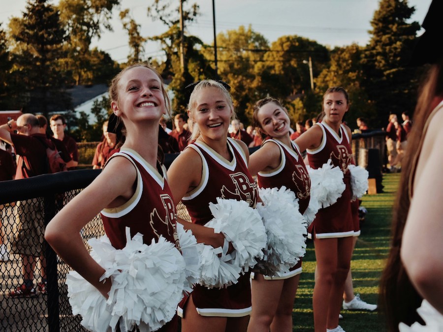 happy girls on cheer team | The Peaceful Mind Counseling Center