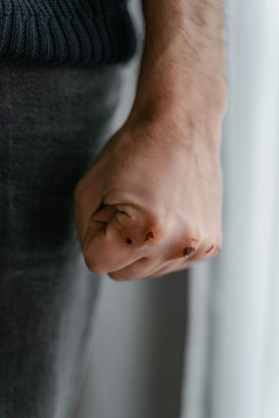 angry clenched fist | The Peaceful Mind Counseling Center