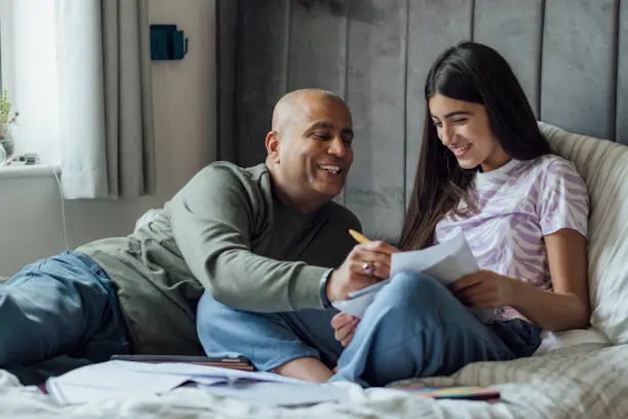 dad supporting daughter | The Peaceful Mind Counseling Center