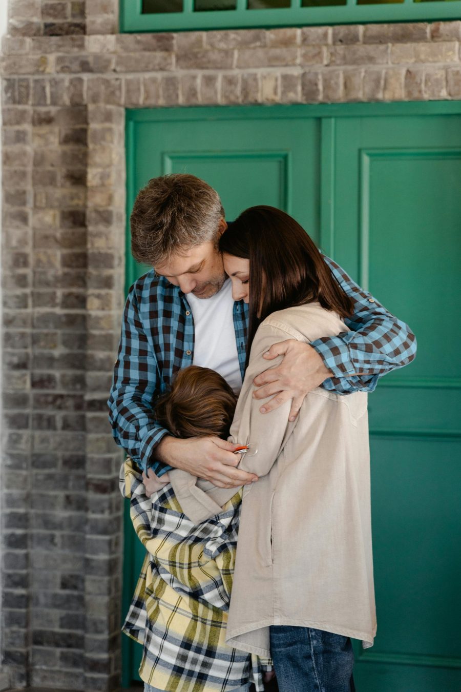 Parents supporting child through divorce | The Peaceful Mind Counseling