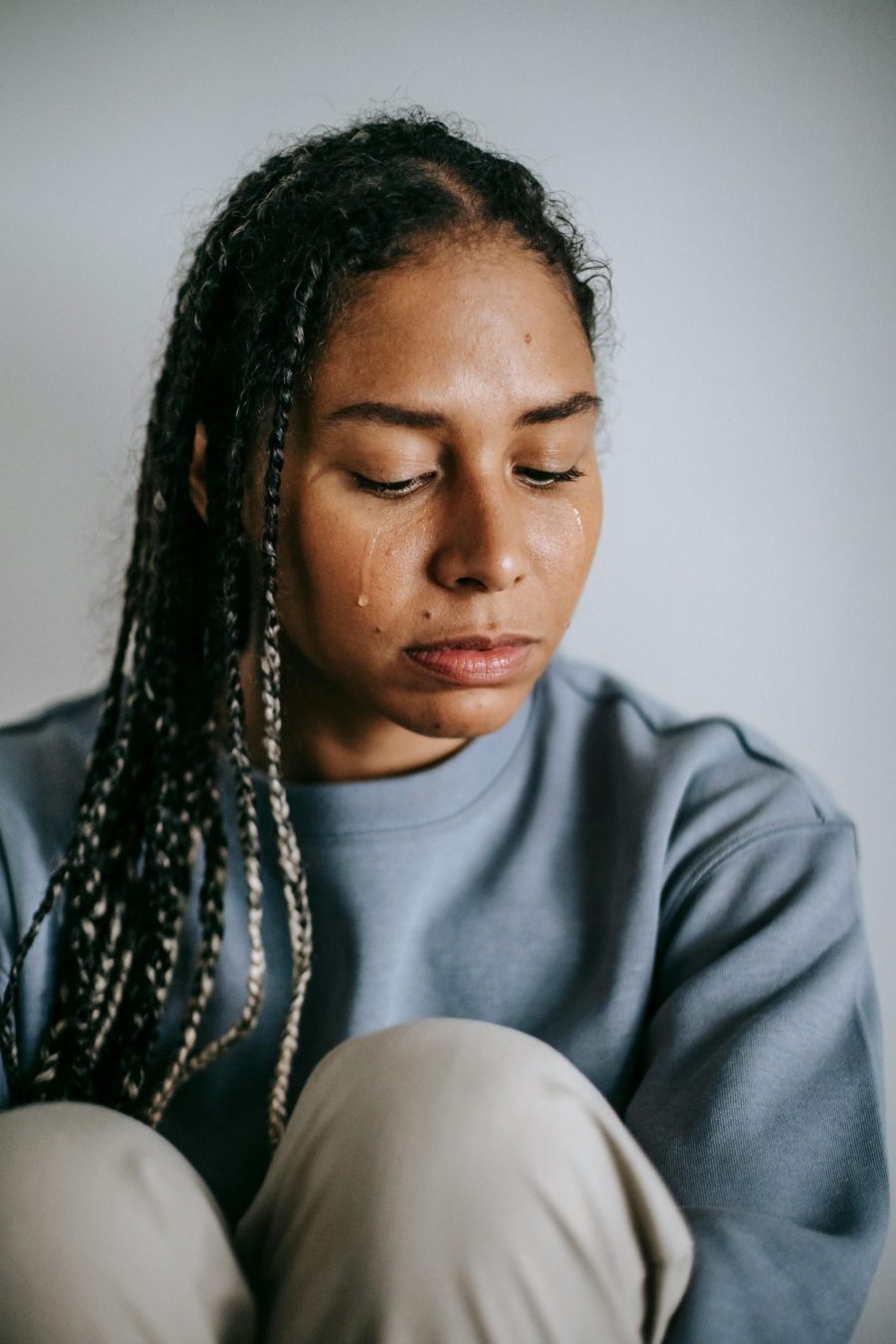 Woman having feelings of grief | The Peaceful Mind Counseling