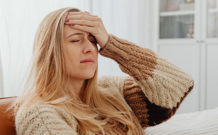 Woman physically unwell from anxiety | The Peaceful Mind Counseling Center